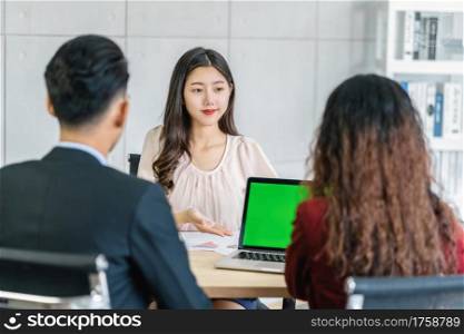 Young Asian woman graduate interviewing with two manager by presentation with technology laptop in meeting room,Job interview with manager, Business Hiring new member concept