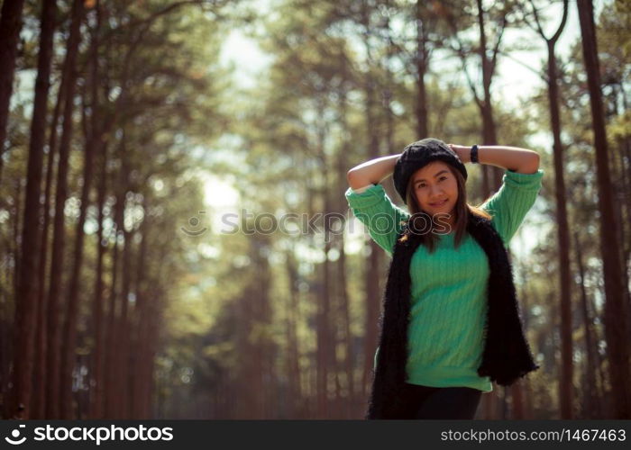 Young asian woman in autumn park