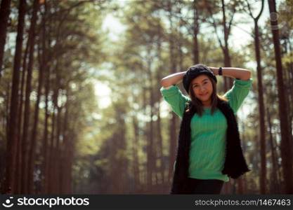 Young asian woman in autumn park