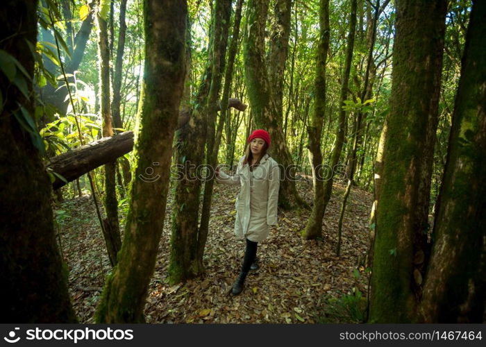 Young asian woman in autumn park