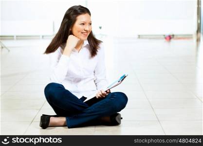 Young asian woman in casual. Image of young asian woman in casual wear