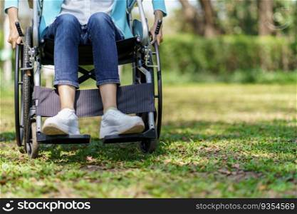 Young asian woman in wheelchair with positive thinking