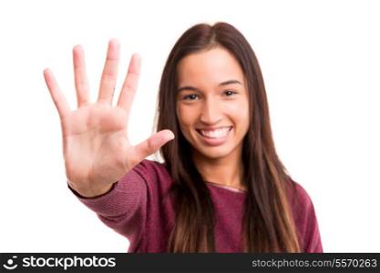 Young asian woman making stop sign with her right hand