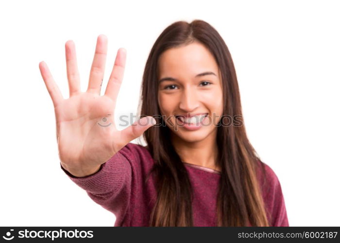 Young asian woman making stop sign with her right hand