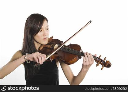 Young Asian woman plays the violin