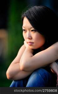Young asian woman portrait. Young asian woman portrait, natural blurred background