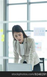 Young asian woman working at a call center Consulting about stock investment information with customers calling for advice with emotion of serious and concern