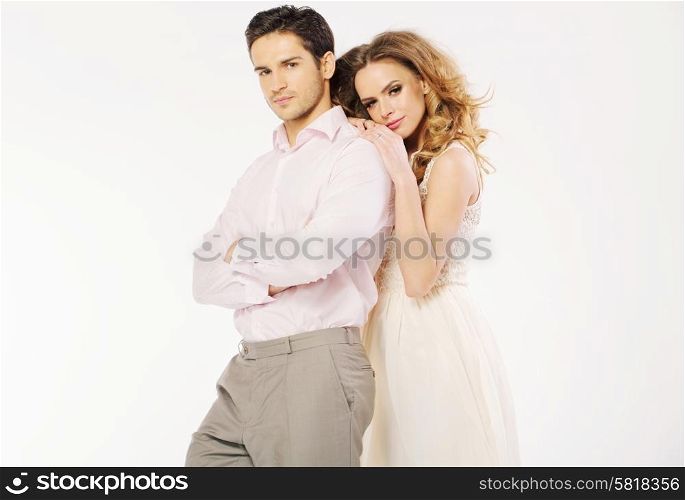Young attractive couple in the love gesture