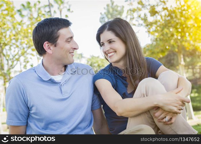 Young Attractive Couple Portrait Outdoors in the Park.