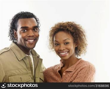 Young attractive couple smiling.