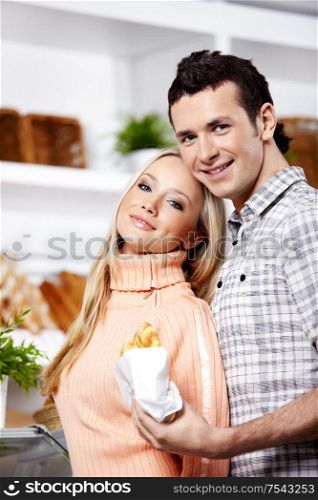 Young attractive couple with meal close up
