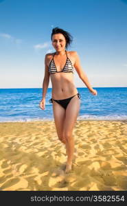 young attractive girl on the beach