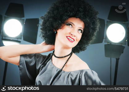 Young attractive girl with afro curly haircut