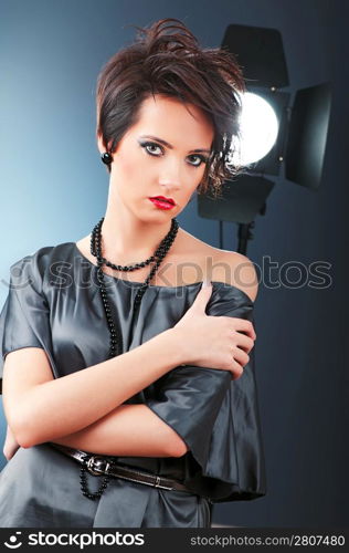 Young attractive girl with in the studio shooting