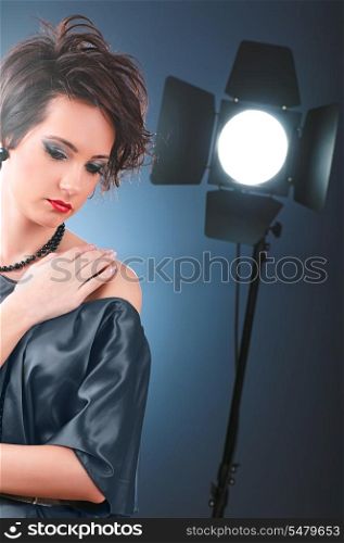 Young attractive girl with in the studio shooting