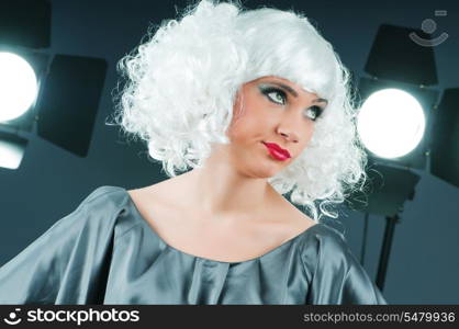 Young attractive girl with in the studio shooting