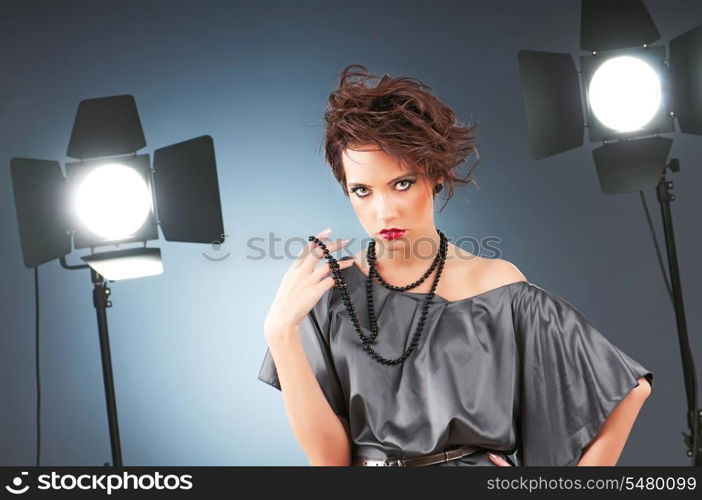 Young attractive girl with in the studio shooting