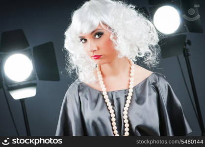 Young attractive girl with in the studio shooting