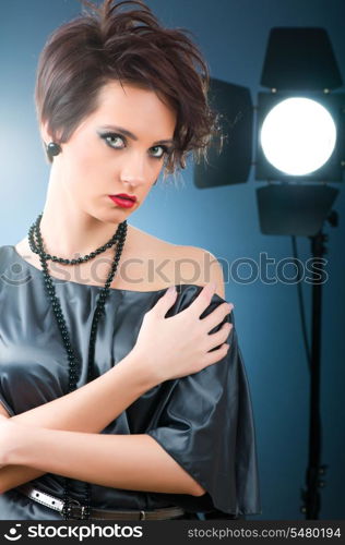 Young attractive girl with in the studio shooting