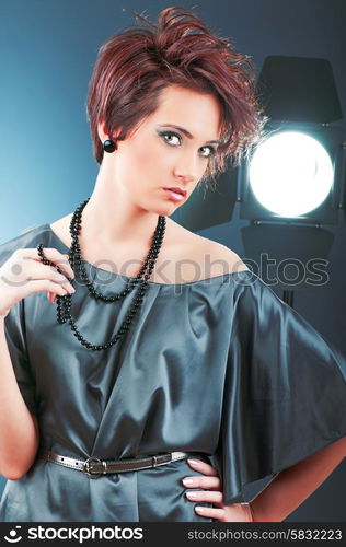 Young attractive girl with in the studio shooting