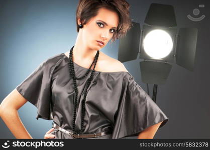 Young attractive girl with in the studio shooting