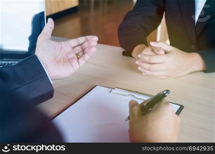 Young attractive man during job interview. human resources concept.