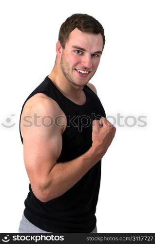 Young attractive man flexing his biceps and smiling
