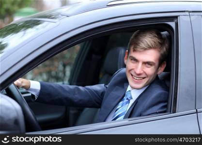 young attractive man young man in the car