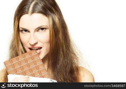 young attractive woman eating chocolate, over white