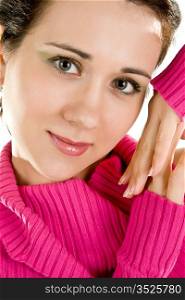 young attractive woman in a pink sweater