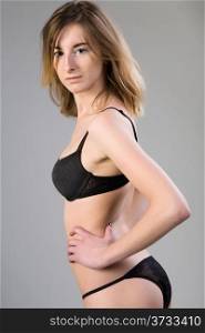young attractive woman in beautiful black lingerie