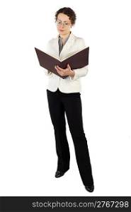 young attractive woman in business dress standing and reading big book isolated on white