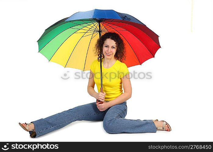 young attractive woman in yellow shirt with multicolored umbrella sitting isolated on white legs at sides
