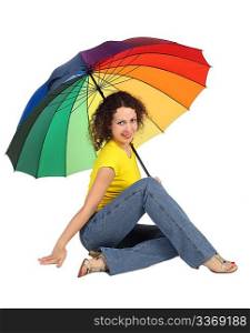 young attractive woman in yellow shirt with multicolored umbrella sitting isolated on white looking at camera