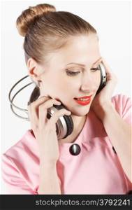 young attractive woman listening to music on headphones