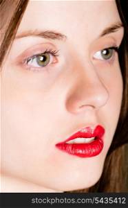 Young attractive woman&rsquo;s face close up red lips