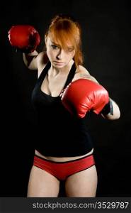 young attractive woman the boxer on training