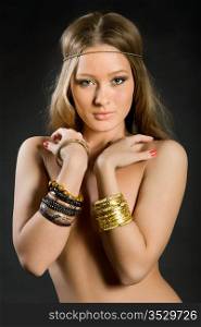 young attractive woman with bracelets on hands