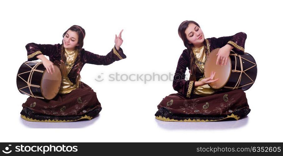 Young azeri woman playing traditional drum nagara