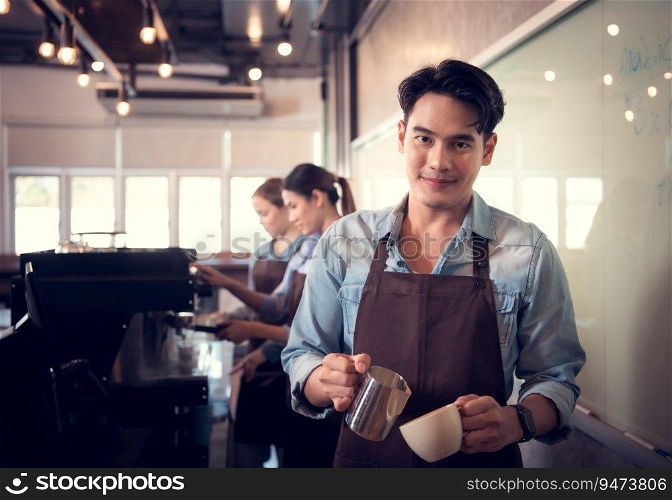 Young barista adept in ch&ion coffee brewing, creating latte art in a cup of coffee for a customer.