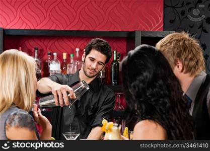 Young barman prepare drink friends at cocktail bar
