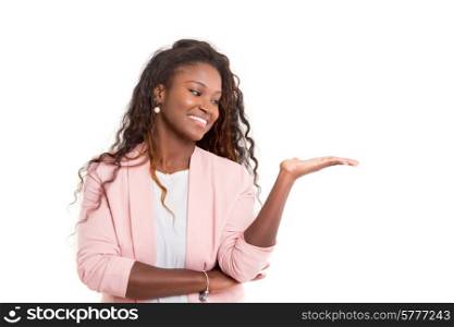 Young beautiful african woman presenting your product, isolated over white background