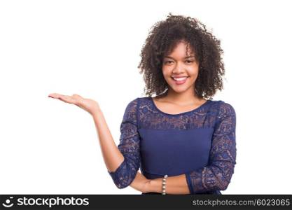 Young beautiful african woman presenting your product, isolated over white background