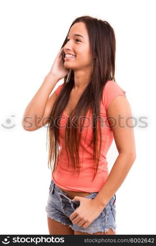 Young beautiful asian woman at the phone, isolated over a white background