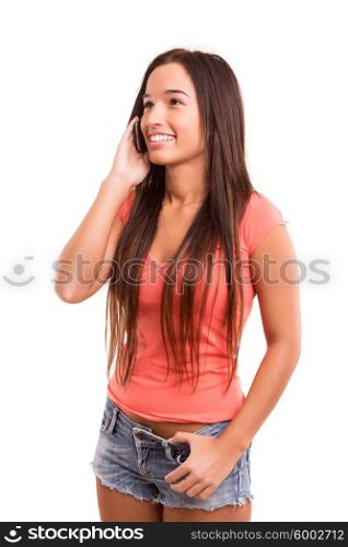 Young beautiful asian woman at the phone, isolated over a white background