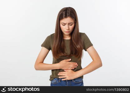 Young beautiful asian woman having painful stomachache on white background. Young beautiful asian woman having painful stomachache on white background.