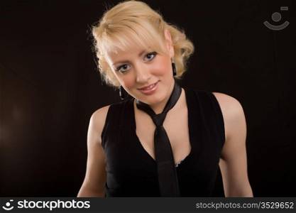 young beautiful blonde on a black background
