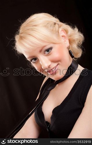 young beautiful blonde on a black background