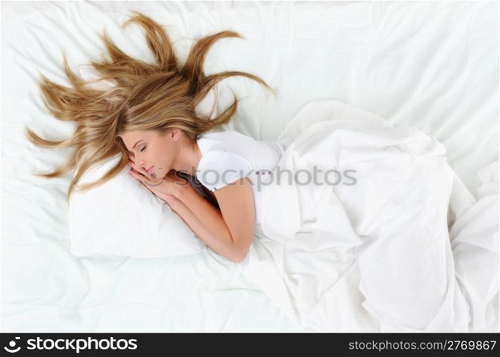 young beautiful blonde woman on the bed