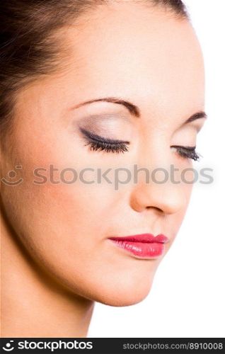 Young beautiful brunette woman close-up portrait isolated on white